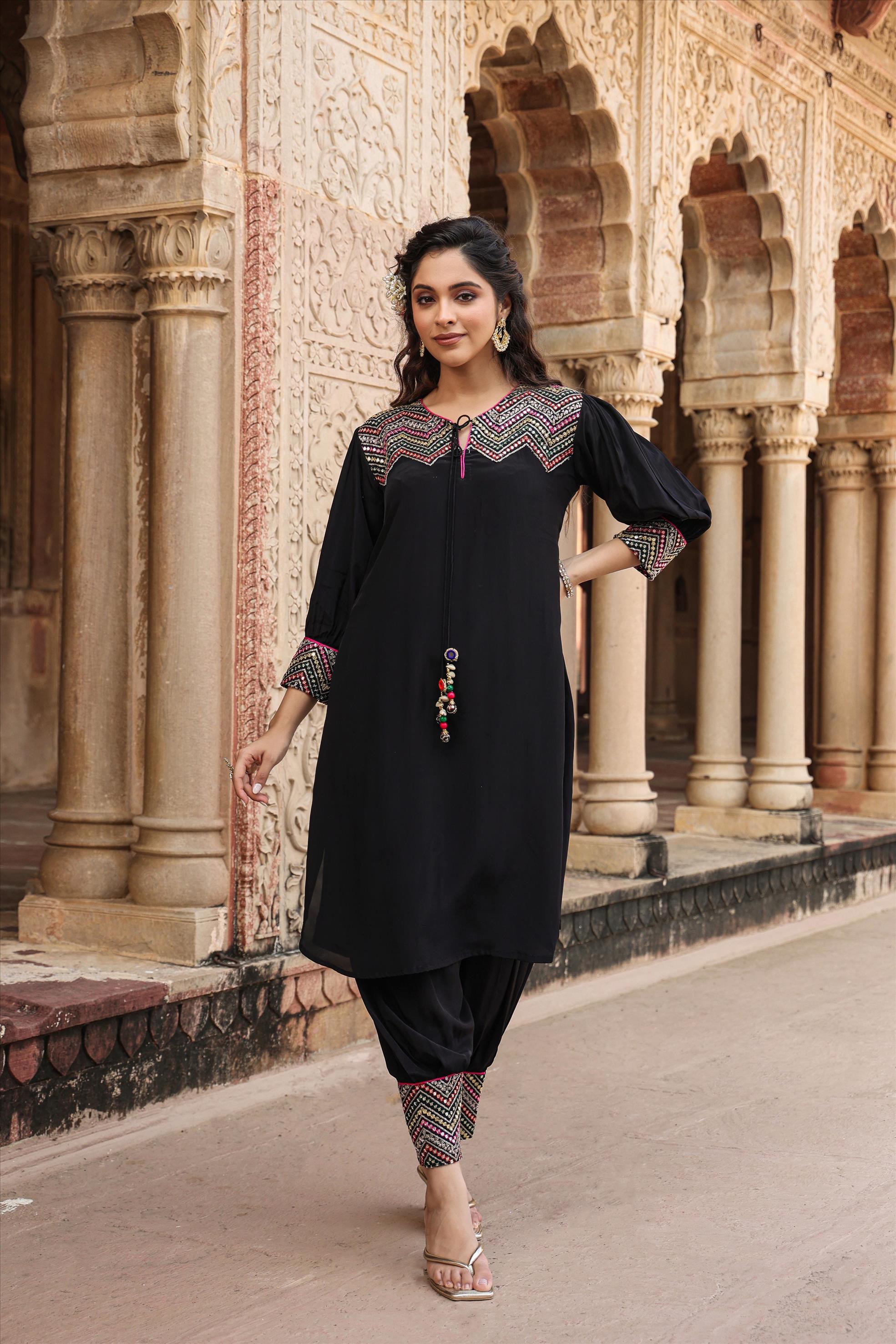 Black Crepe Embroidered Patiala Suit With Embellished Potli