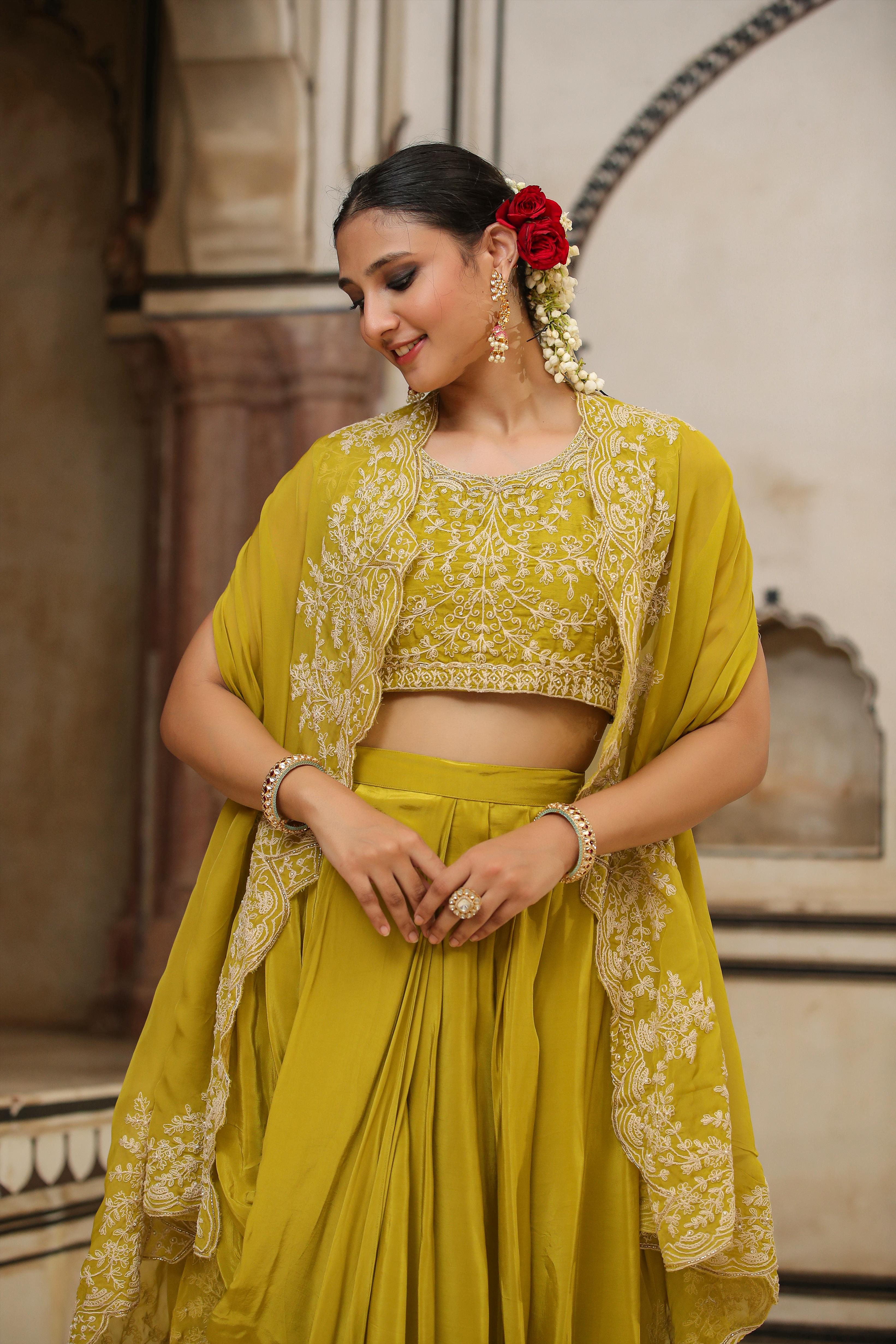 Silk Embroidered Choli With Crepe Drape Skirt And Organza Cape
