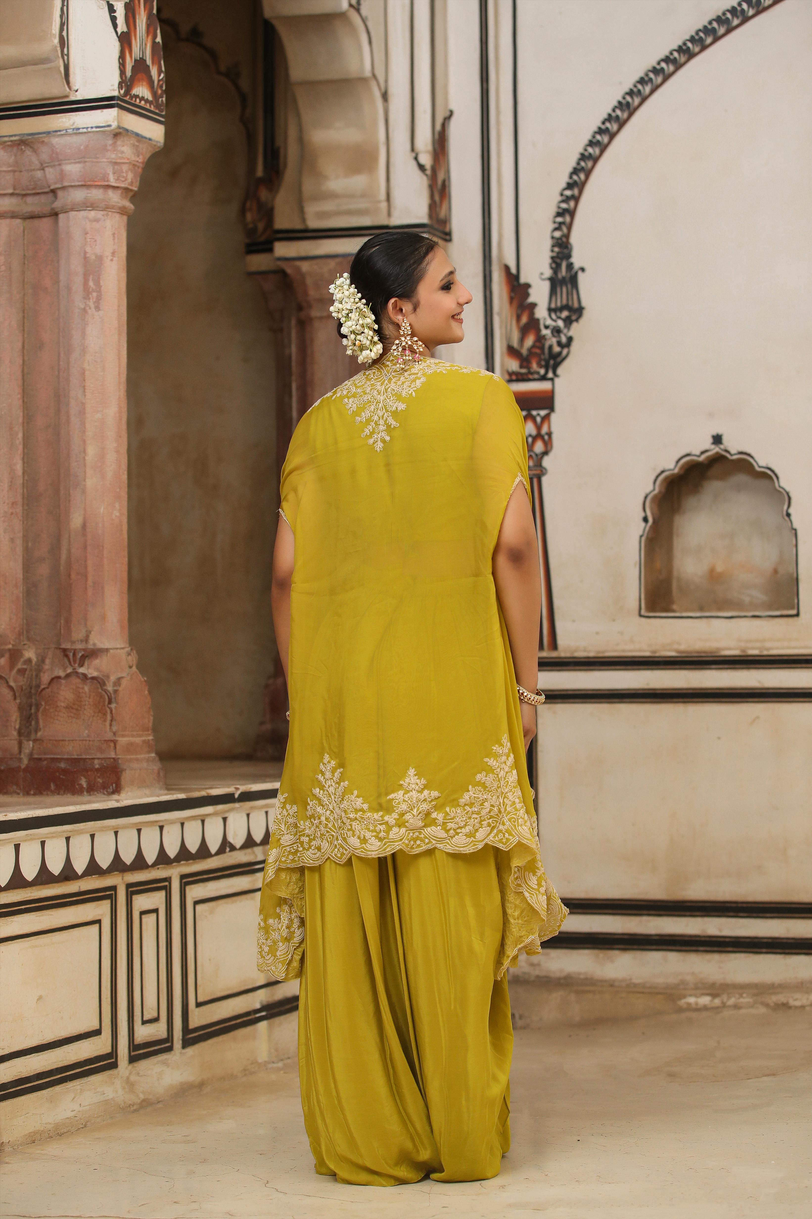 Silk Embroidered Choli With Crepe Drape Skirt And Organza Cape