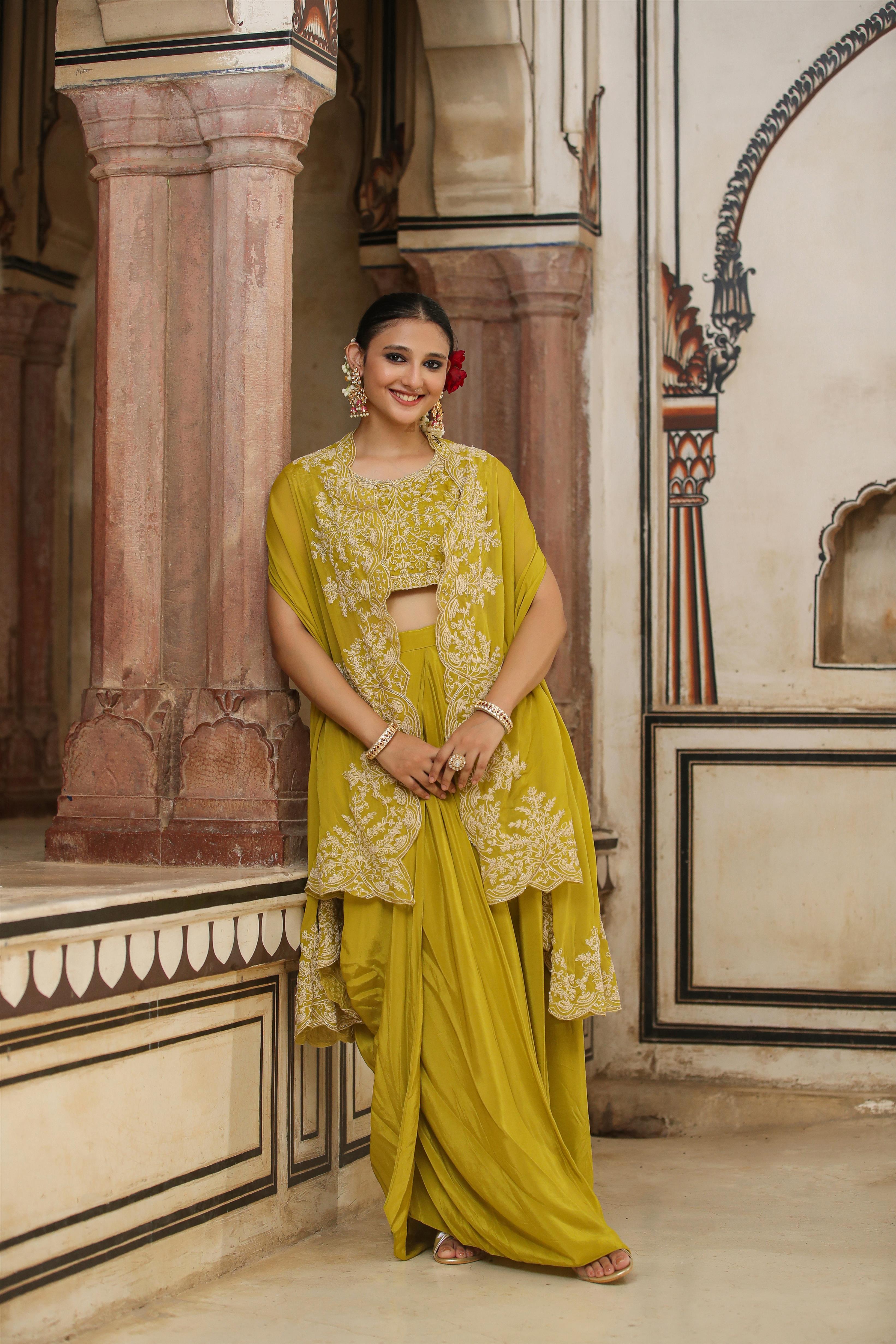 Silk Embroidered Choli With Crepe Drape Skirt And Organza Cape