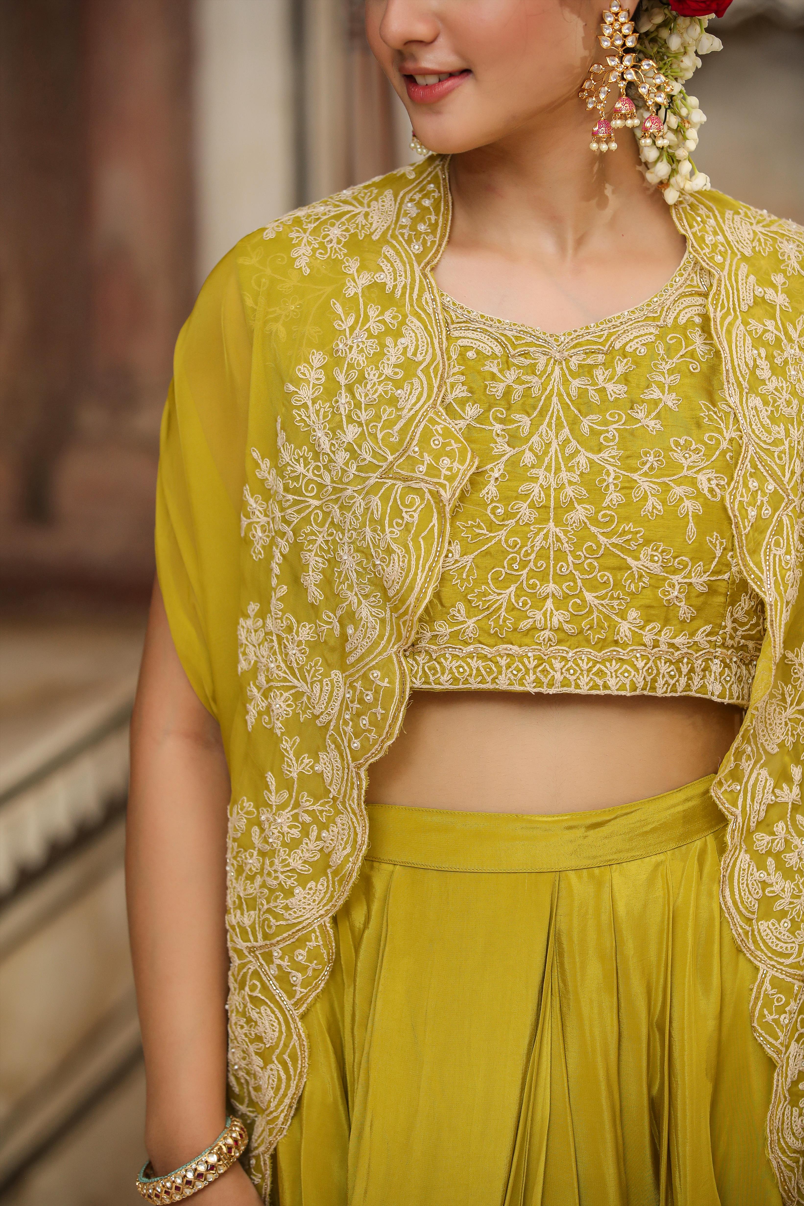 Silk Embroidered Choli With Crepe Drape Skirt And Organza Cape