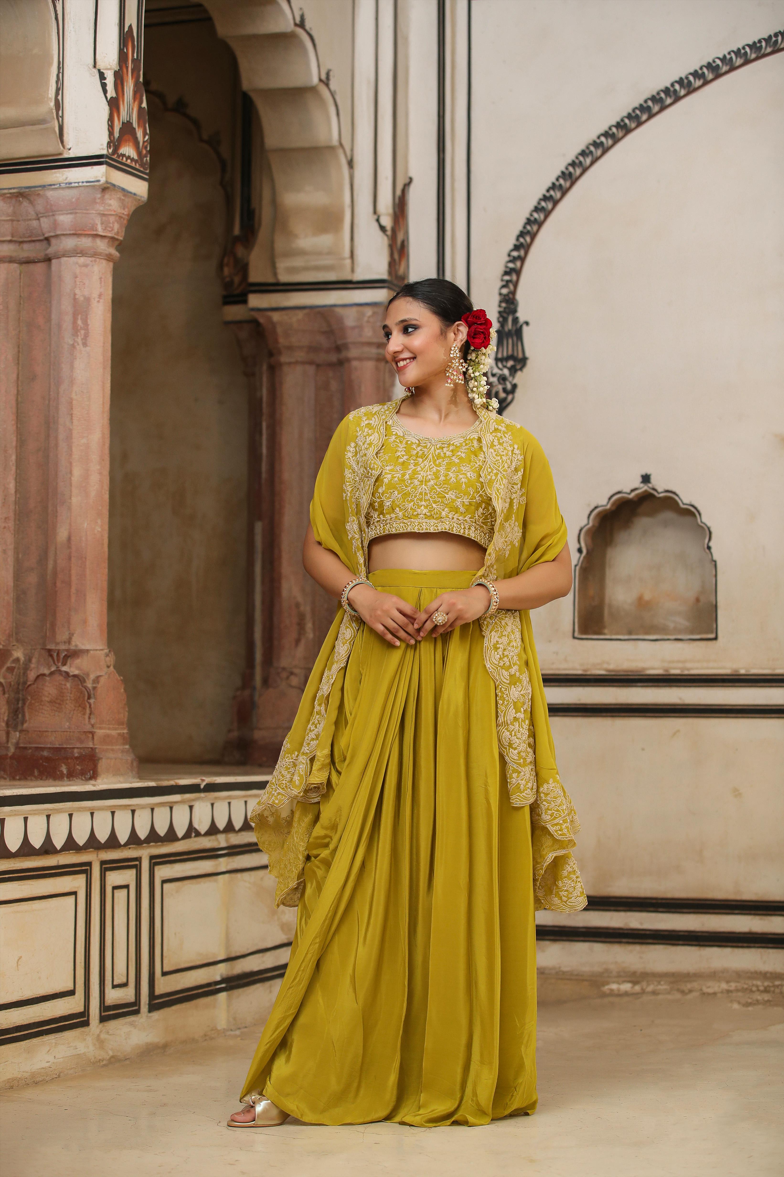 Silk Embroidered Choli With Crepe Drape Skirt And Organza Cape
