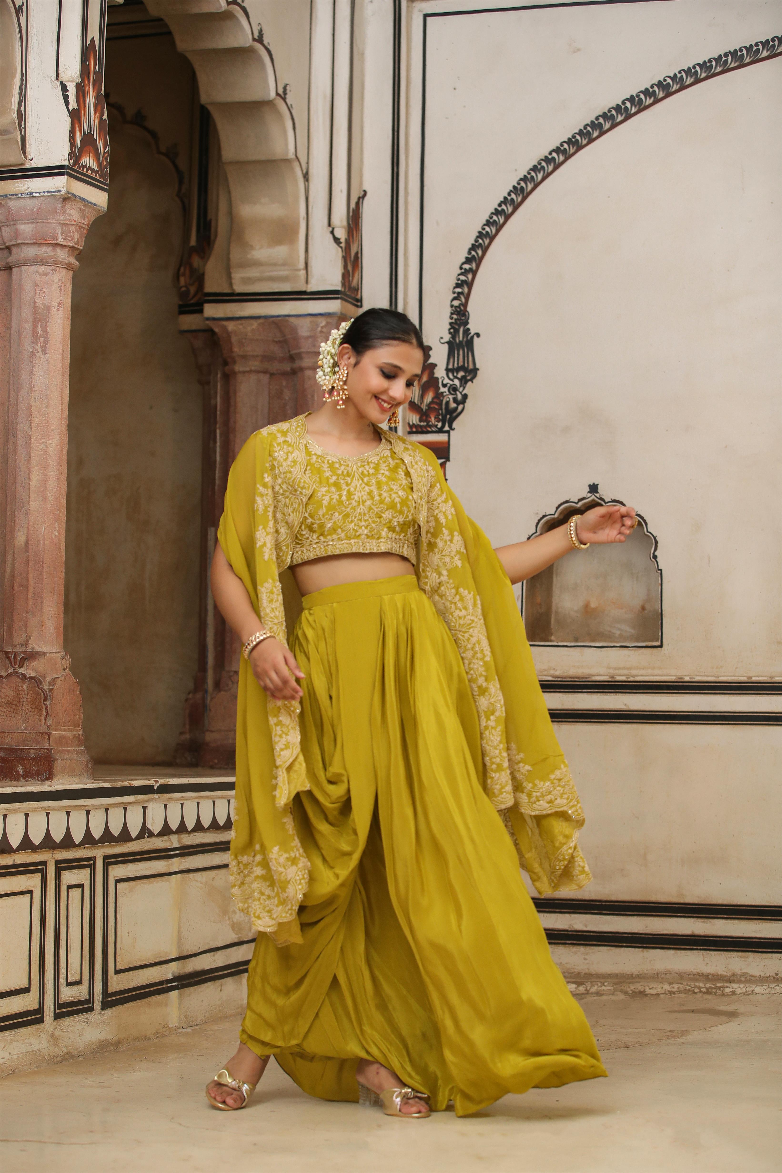 Silk Embroidered Choli With Crepe Drape Skirt And Organza Cape