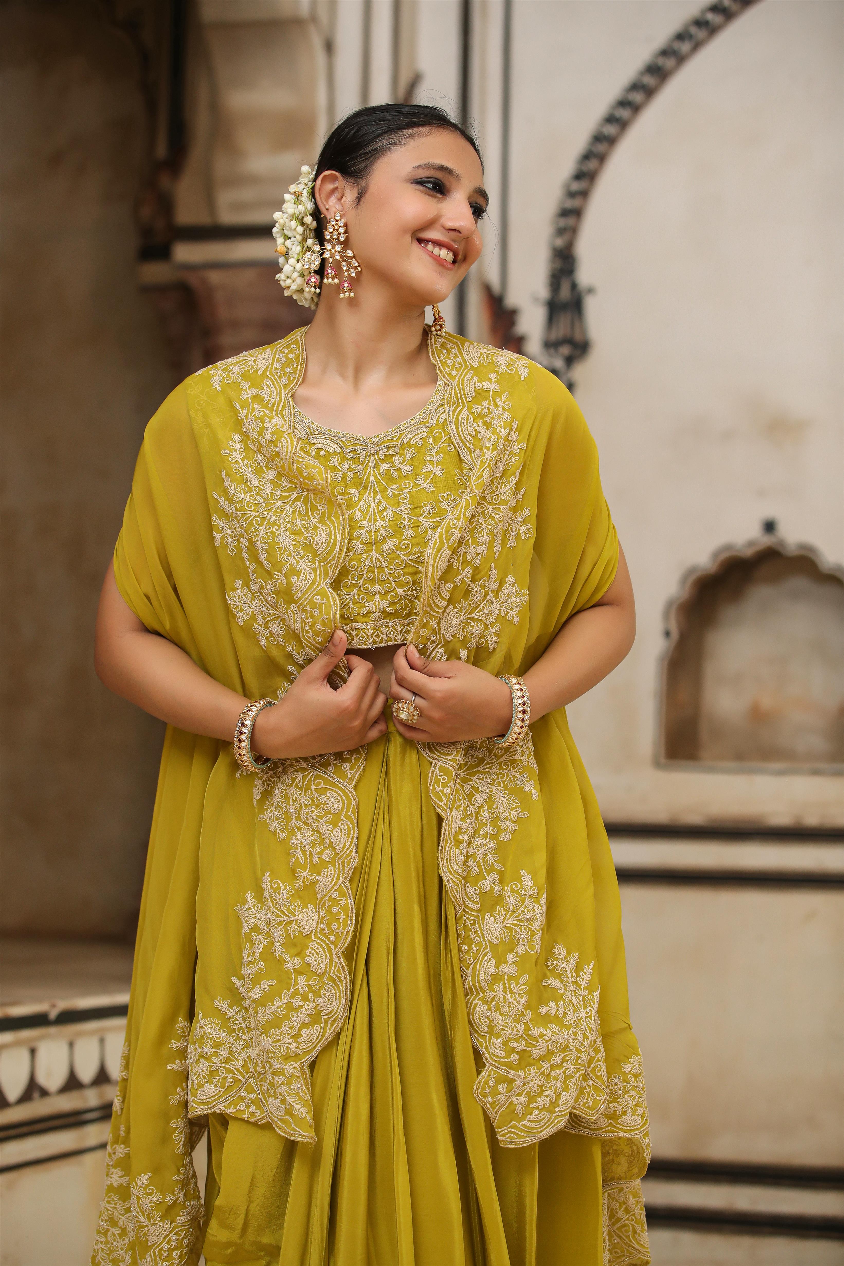 Silk Embroidered Choli With Crepe Drape Skirt And Organza Cape