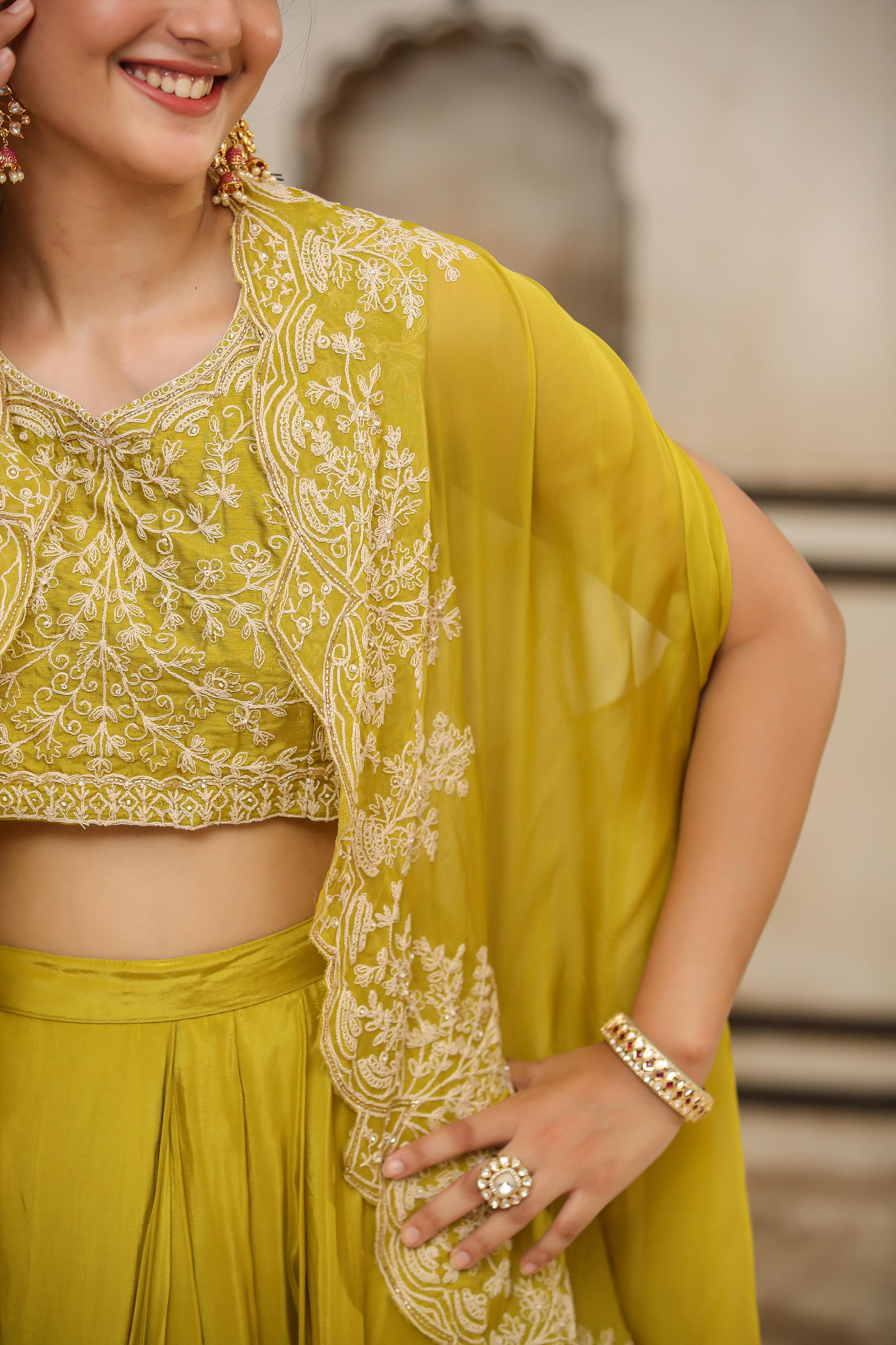 Silk Embroidered Choli With Crepe Drape Skirt And Organza Cape