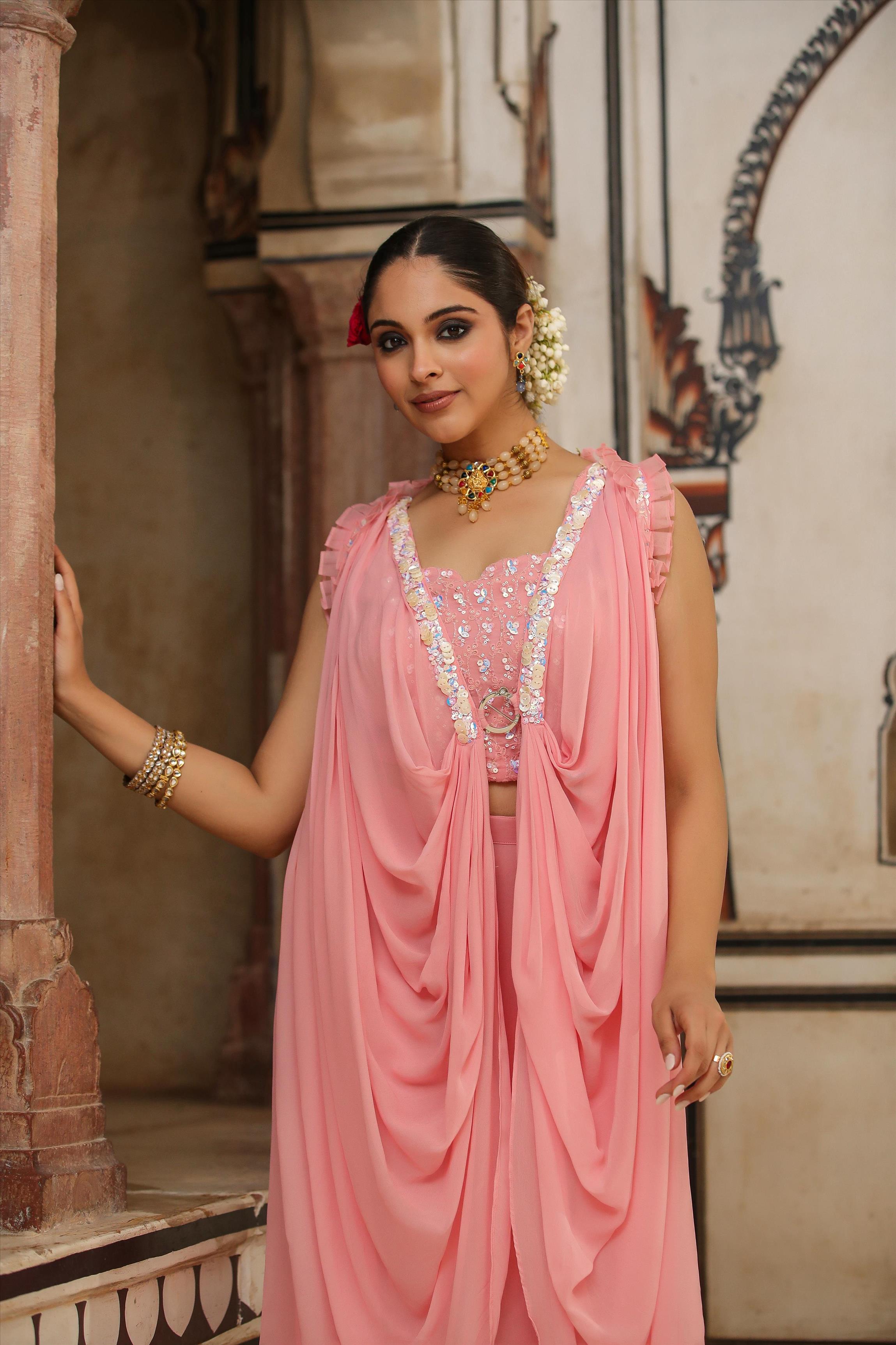 Peach Georgette Embroidered Choli With Palazzo And Pleated Overlay Cape