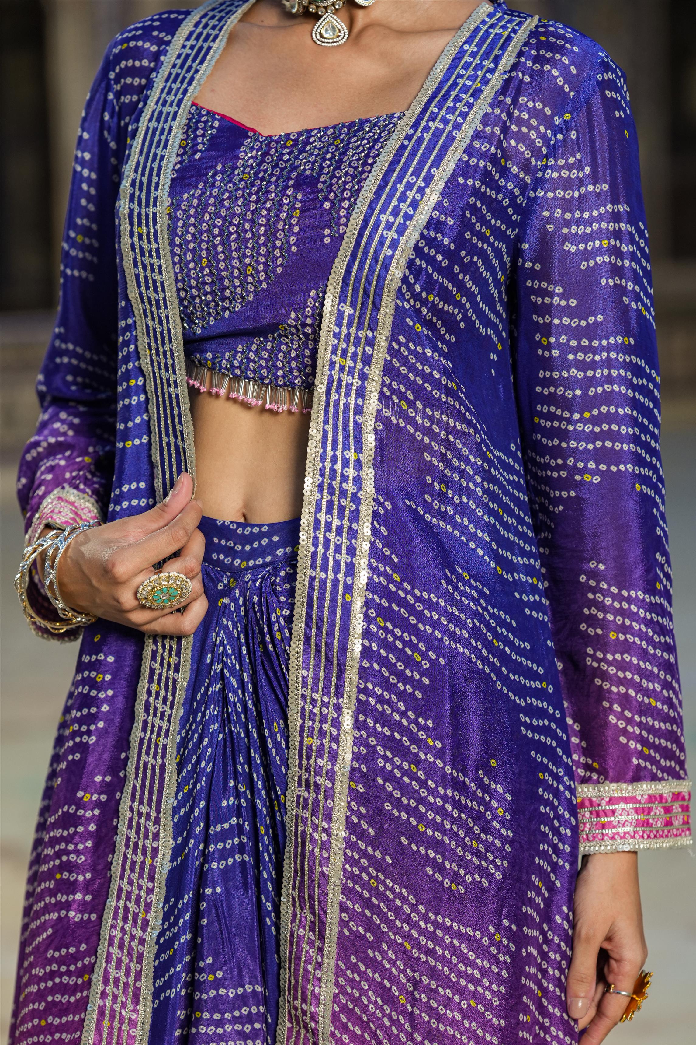 Blue Chinon Silk Bandhani Print Choli With Drape Skirt And Cape